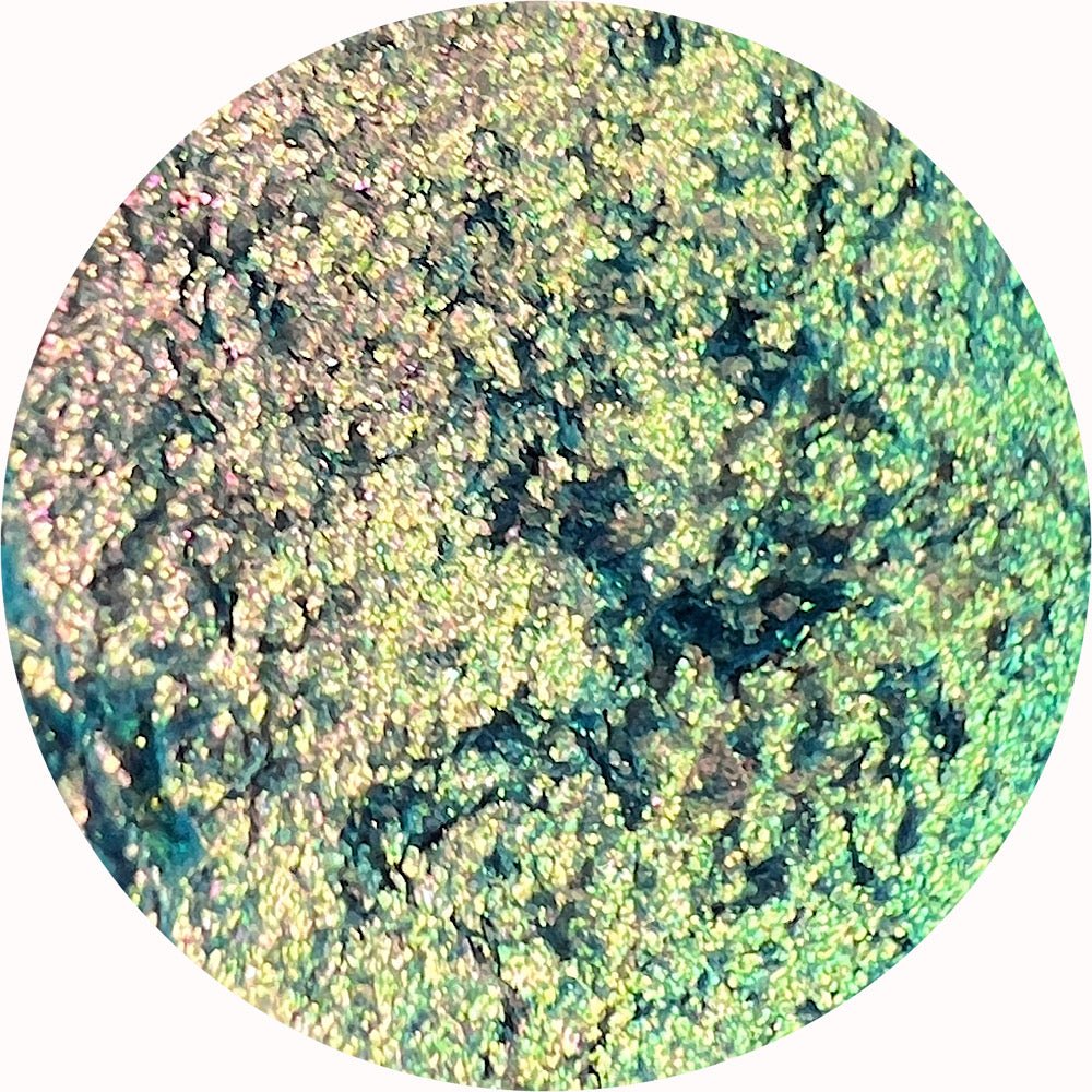 Iconic multichrome eyeshadow shift of turquoise emerald green gold champagne pink high shine metallic